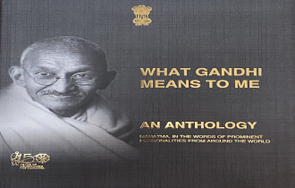 President Faure receives a copy of "What Gandhi Means To Me: An Anthology"