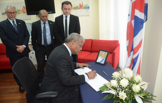 Seychelles President signs condolence book in honour of Her Majesty Queen Elizabeth II at the British High Commission
