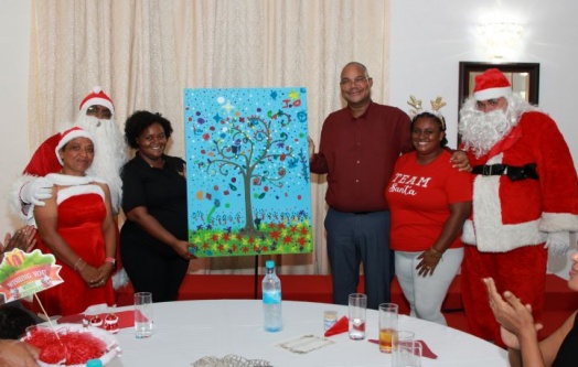 President Dr. Patrick Herminie and First Lady Mrs. Véronique Herminie Host Christmas Celebration for Children in Care Homes