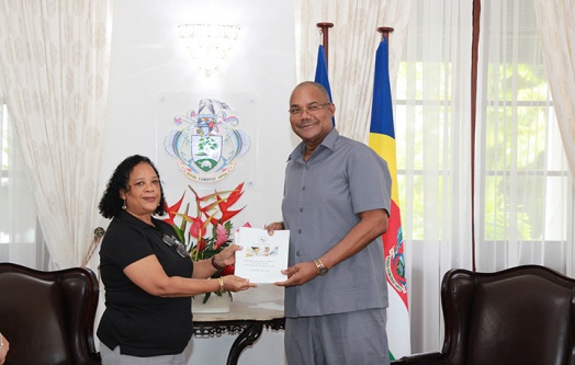 Electoral Commission Presents Official Elections Reports to President Herminie