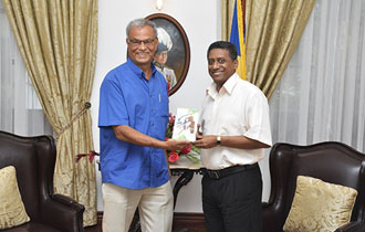 Seychellois Author Mr Grandcourt Pays Courtesy Call to President Faure