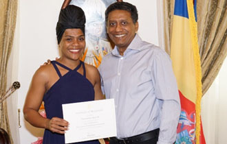 President Faure Welcomes Gold Medallist Female Weightlifter Clementina Agricole
