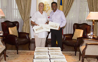 President receives artistic impressions of Old Seychelles from artist Alexandra Azaïs