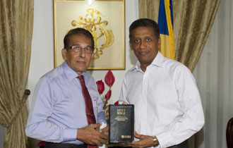 President Faure receives commemorative bible from Gideons International
